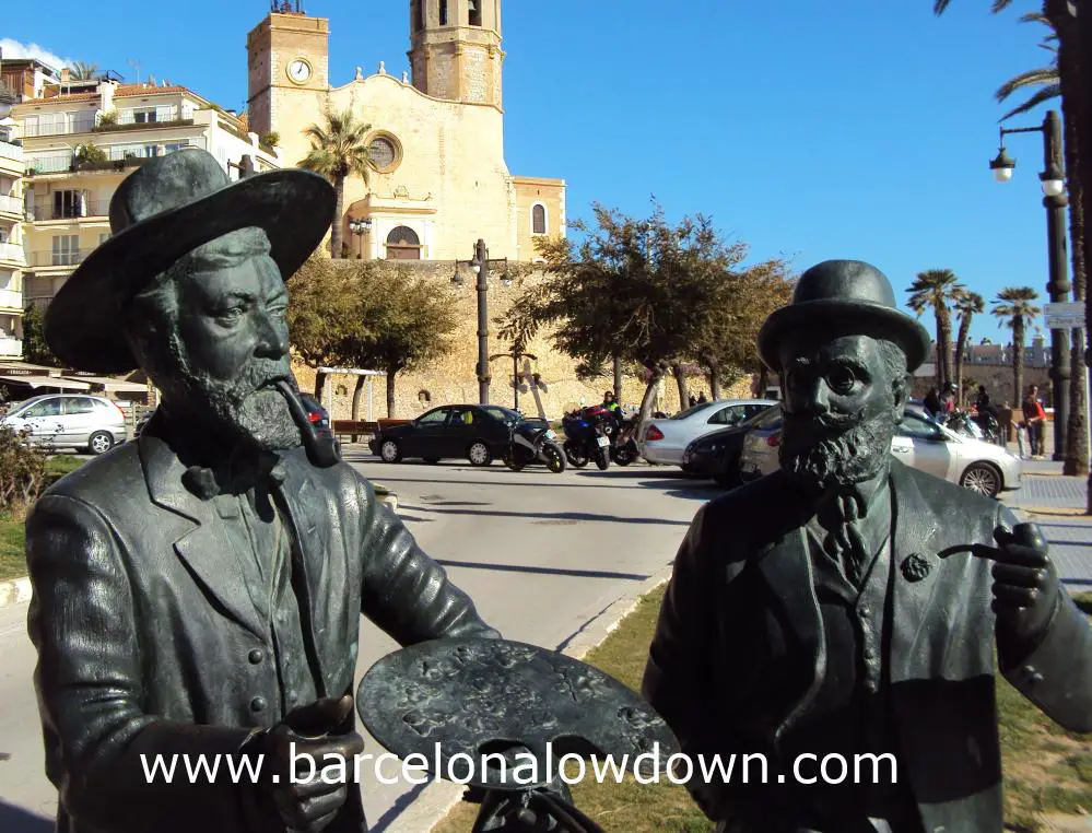 Statue of Santiago Rusiñol and Ramon Casasnear the beach in Sitges