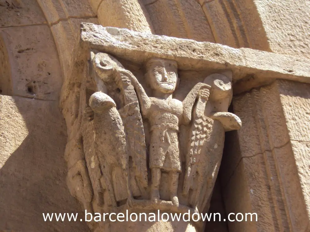 Medieval carvings decorating a doorway opposite the monastery