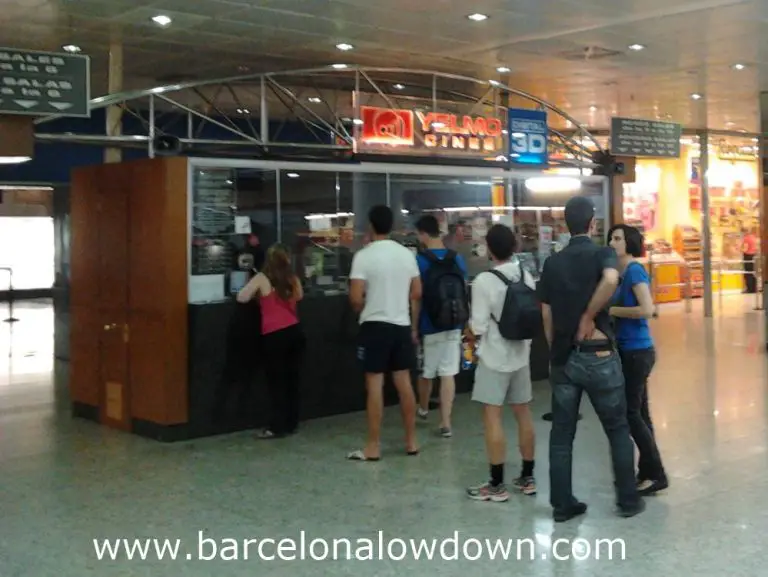 Some people queing to buy tickets at the Icaria english language cinema Barcelona