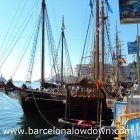 2 wooden ships moored side-by-side
