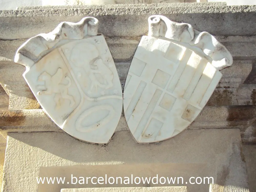 Barcelona and Madrid's coats-of-arms carved in marble