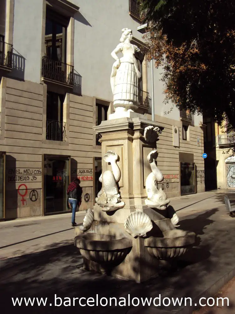 The 5m high white marble Maja fountain in Plaça Vila de Madrid, Barcelona