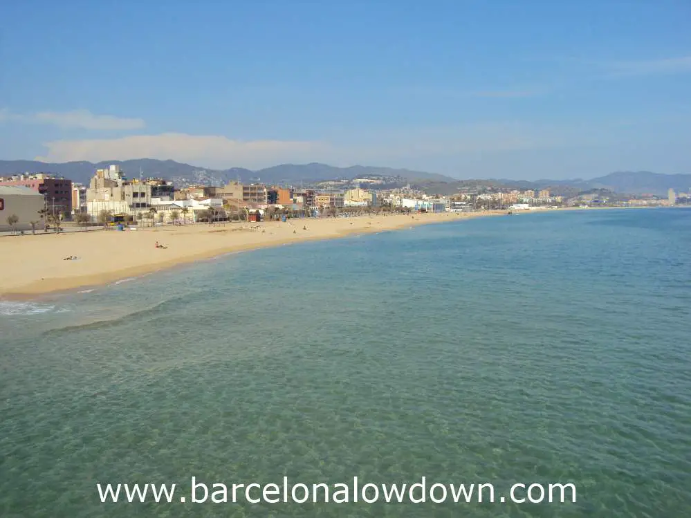 Photo of Badalona taken from the Pont del petroli jetty on a sunny day