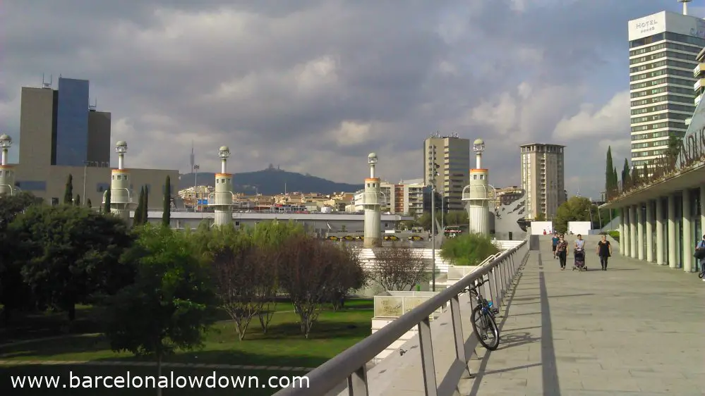 Panoramic view of the Parc de l'Espanya Industrial in Barcelona with distant views of Tibidabo