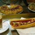 Traditional Spanish breakfast - a cup of coffe and an omlette sandwich