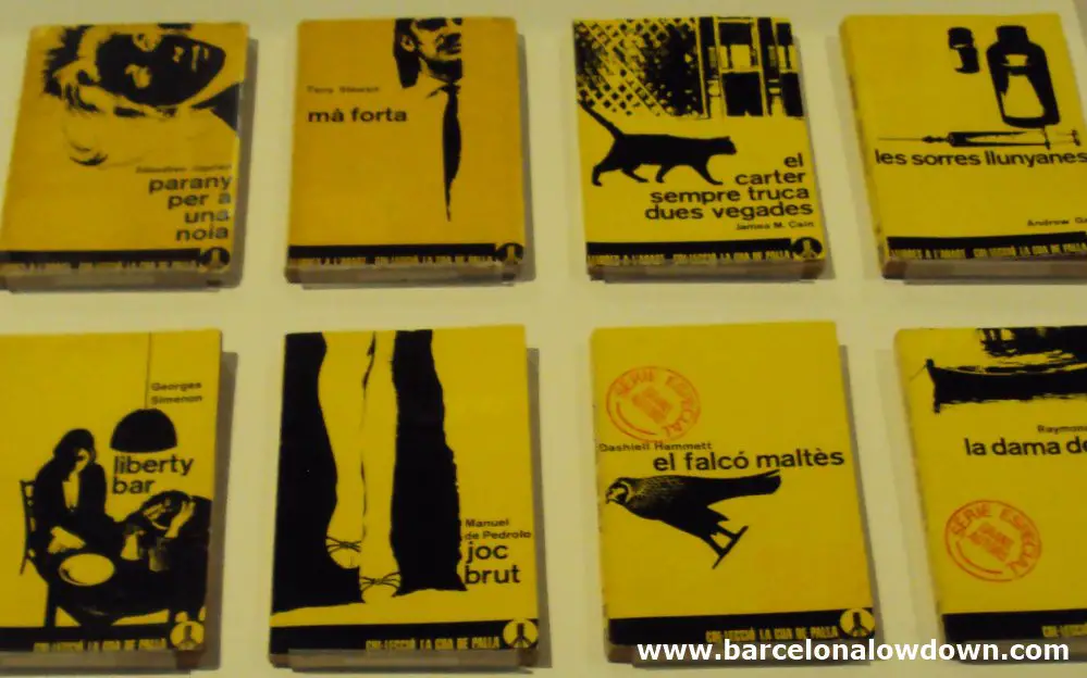 A collection of black and yellow book covers at DHUB Barcelona