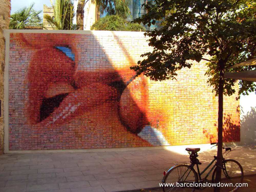 The giant kiss of freedom mosaic in Barcelona's Gothic quarter