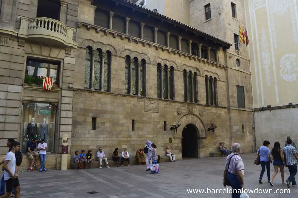 Plaça de la Paeria in Lleida with the beautiful medieval Romaneque style town hall