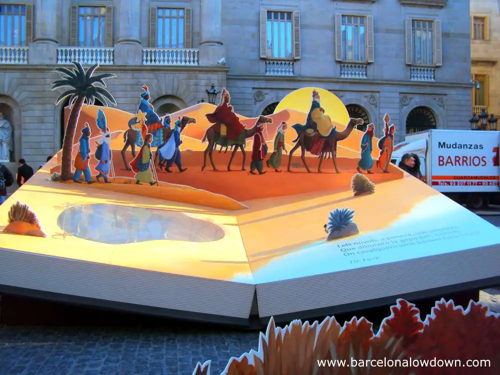 The three wise men portrayed pop-up-book style in Barcelona's annual nativity scene in front of the town hall.