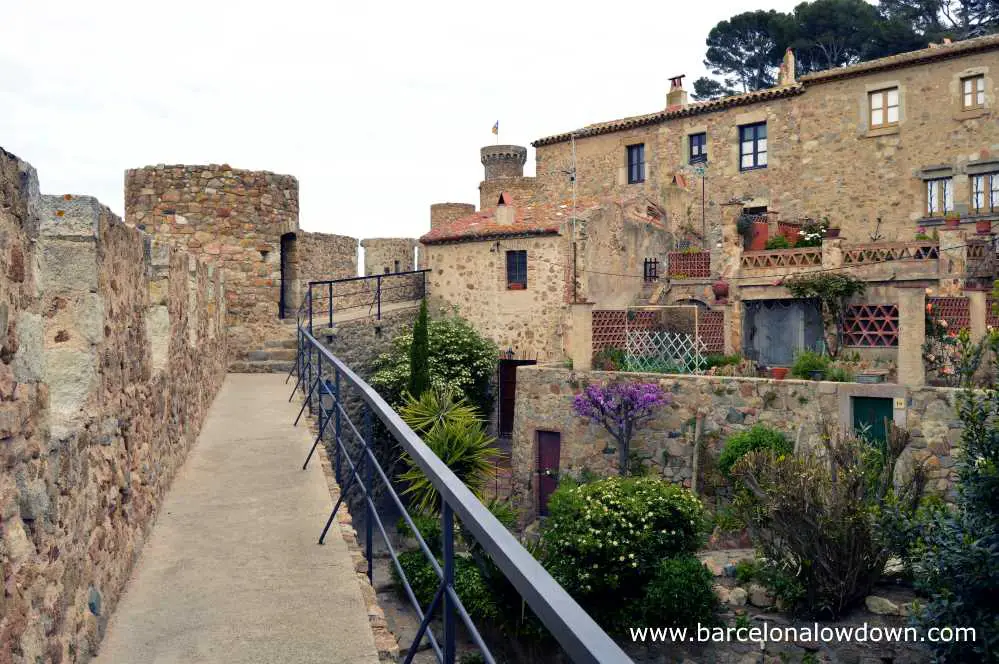 Medieval fortifications, turrets, towers, rooftops and gardens Tossa de Mar Spain