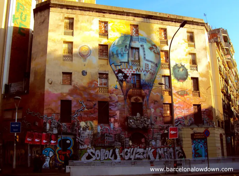 The main facade of the graffiti covered La Carboneria in Barcelona's Sant Antoni neighbourhood