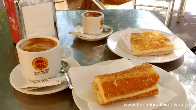 A late breakfast consisting of bread, cheese and coffee is best enjoted in a sunny plaza in Barcelona