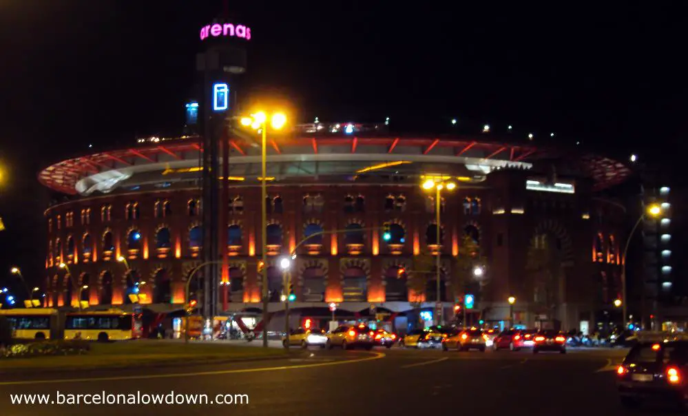 The Las Arenas bull fighting ring lit up at night