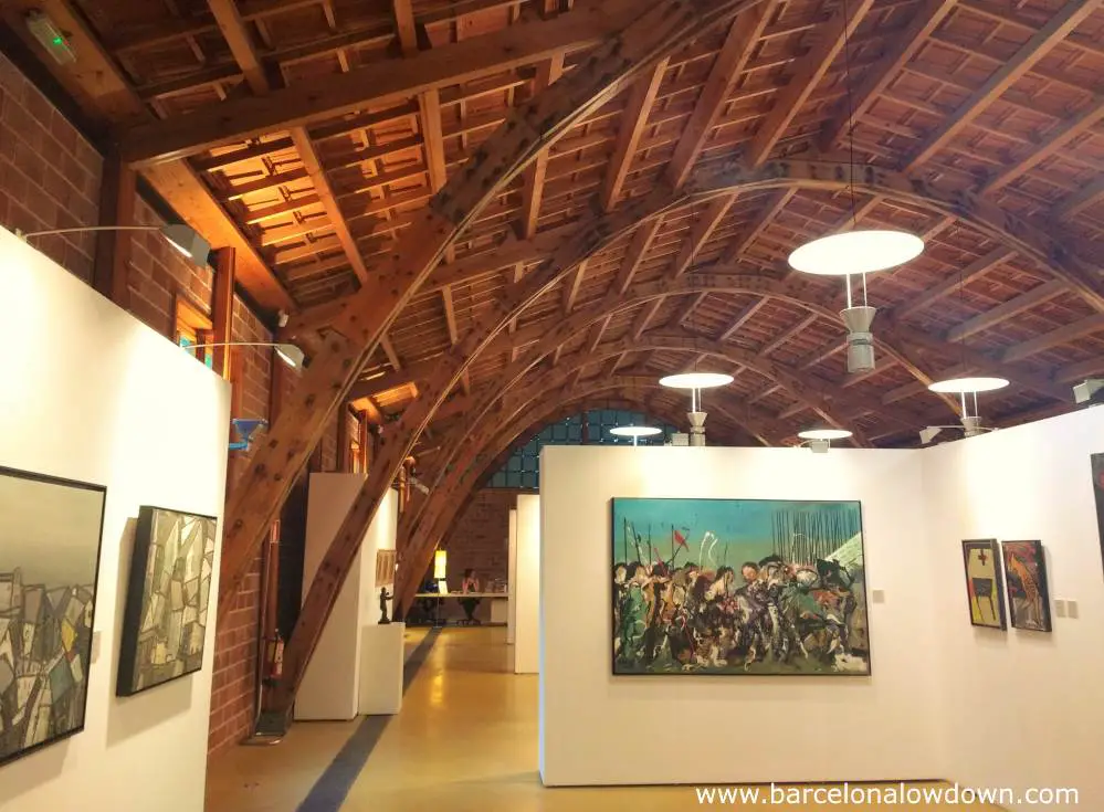 Works of art on display in Nau Gaudi, the main feature of the building are the slender arches which were used by Gaudi in several of his designs.