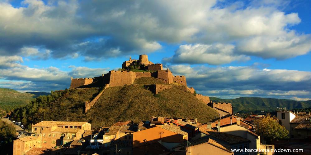 View of Cardona castle and the surrounding hills on a cloudy autumn afternoon, 100km from Barcelona