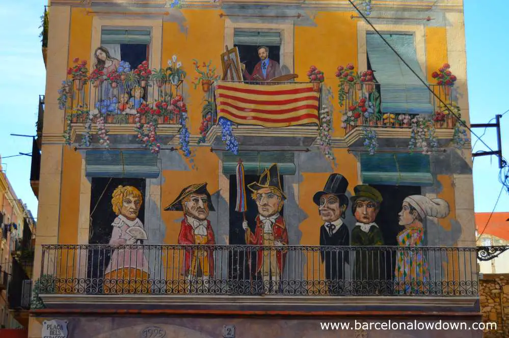 Section of the mural painted on a building in Placa dels Sedassos, Tarragona Spain