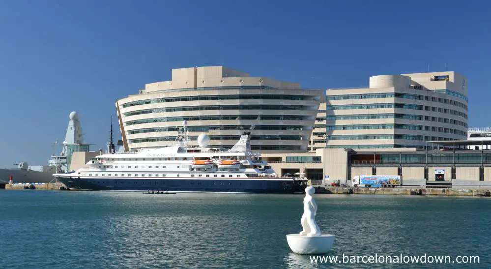 A smaller ship docked at the Barcelona Cruise pier North Terminal