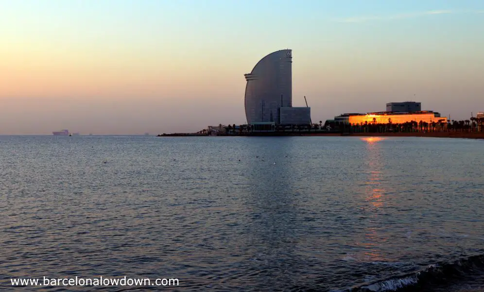 The so called sail hotel which is one of the tallest skyscrapers in Barcelona at sunrise