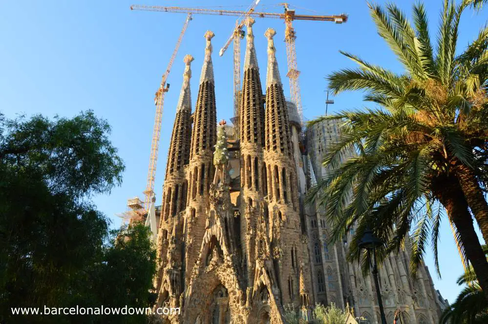 Antoni Gaudi's Sagrada familia as seen from the small park next to the temple