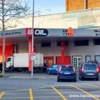 Cars and trucks queueing up for cheap petrol and diesel at Boil, the cheapest petrol station in Barcelona