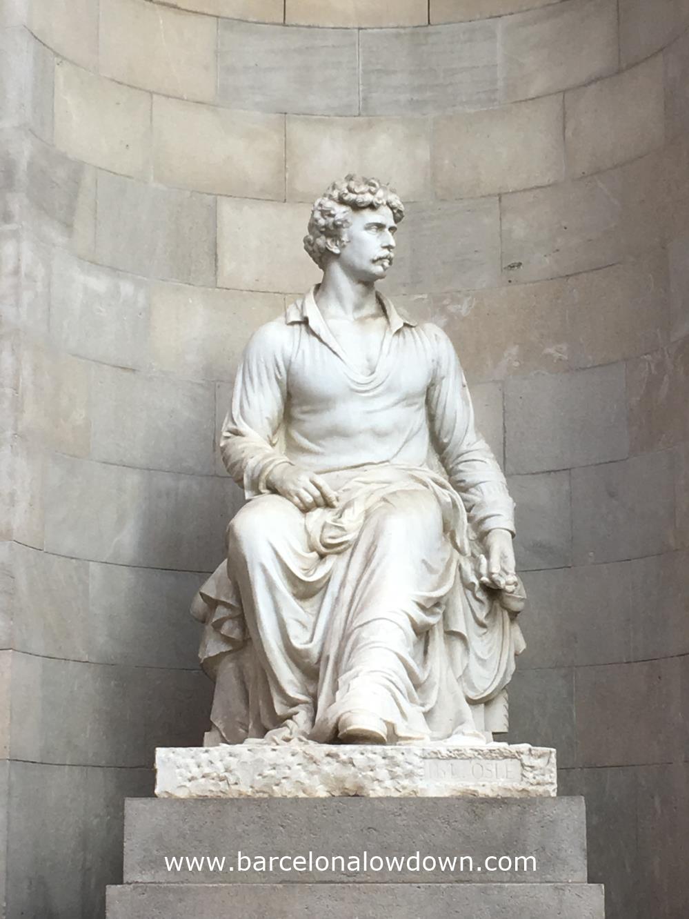 Hyper realistic white marble statue of Catalan artist Marià Fortuny which is located on Carrer del Pintor Fortuny in Barcelona's Gothic Quarter