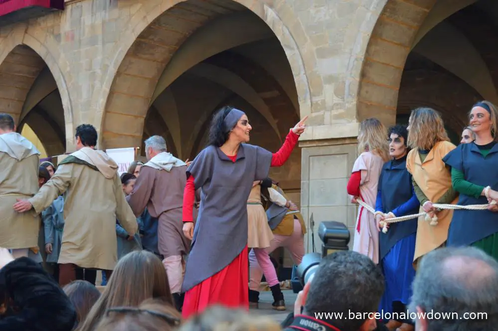 A group of actors in a play about witch hunts during Manreas medieval fair