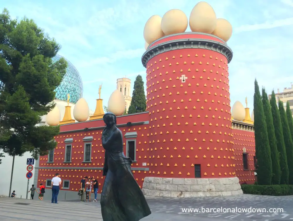 Bronze statue of a woman in front of the Dali Theatre Museum in Figueres, Catalonia, Spain