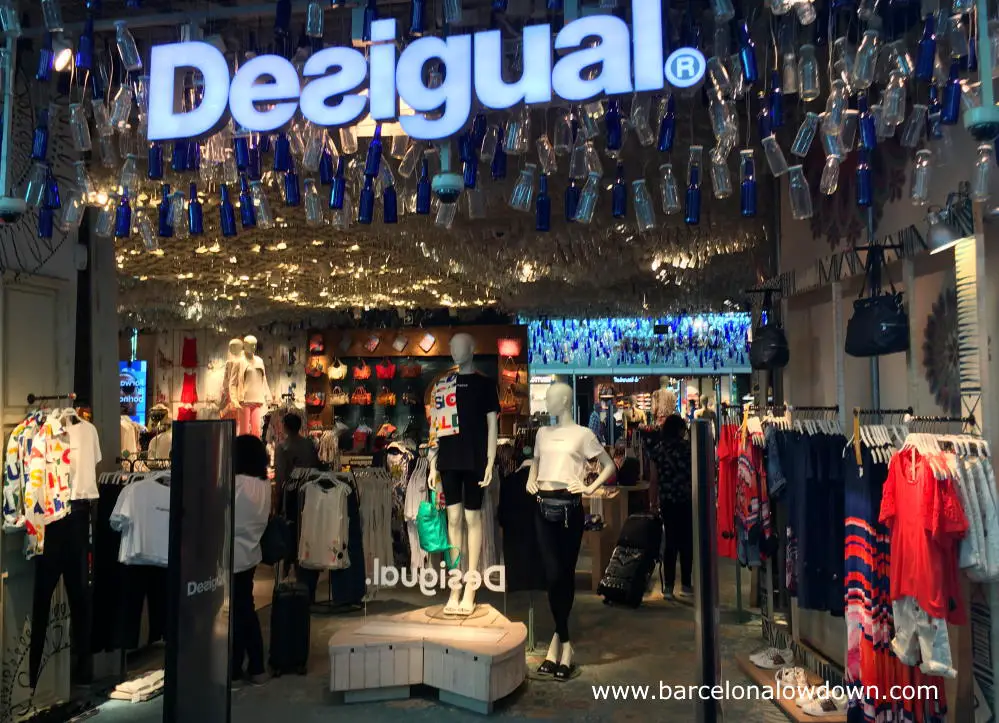 Clothes and dresses in the Desigual store at Barcelona airport