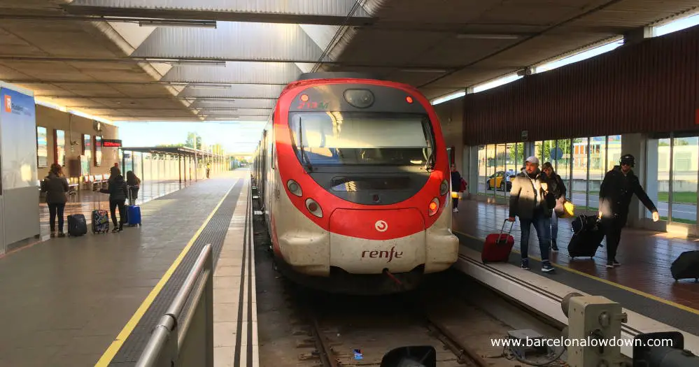 Passengers alighting from the train at Barcelona airport terminal 2