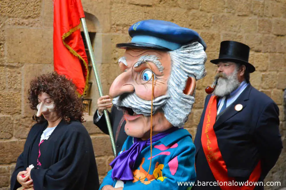 The Nose Man parade through the narrow streets of Barcelona's Gothic Quarter on New Years Eve