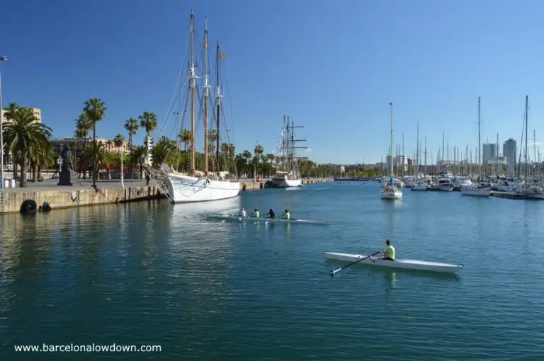 People rowing in Barcelona's Port Vell Harbour