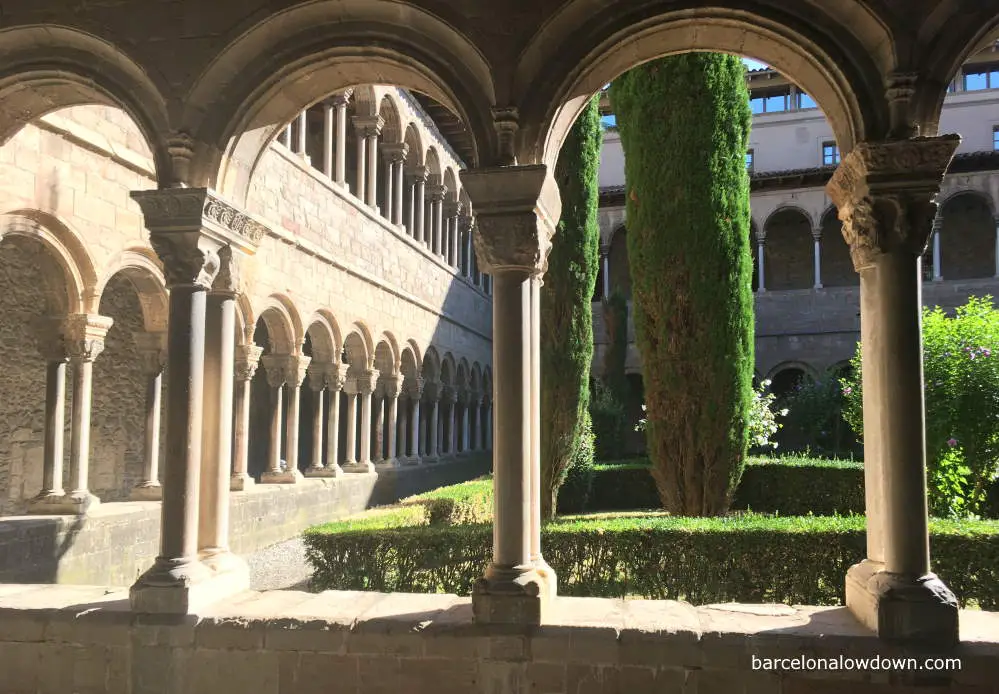 Arches and pillars inside the cloisters of Santa Maria de Ripoll Monastery