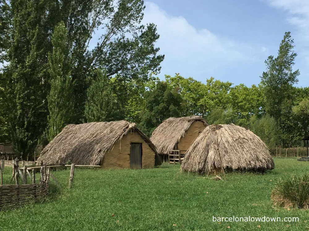 Thatched huts in a recreation of a prehistoric village