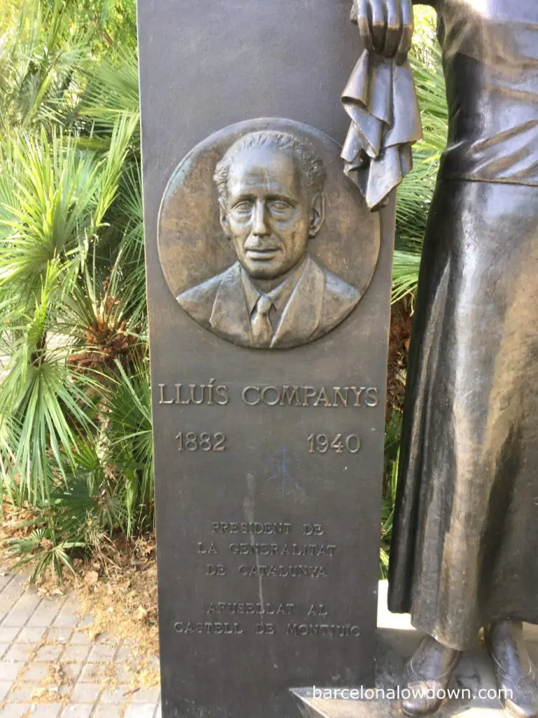 Plaque with the face of Lluís Companys on the girl with a handkerchief monument