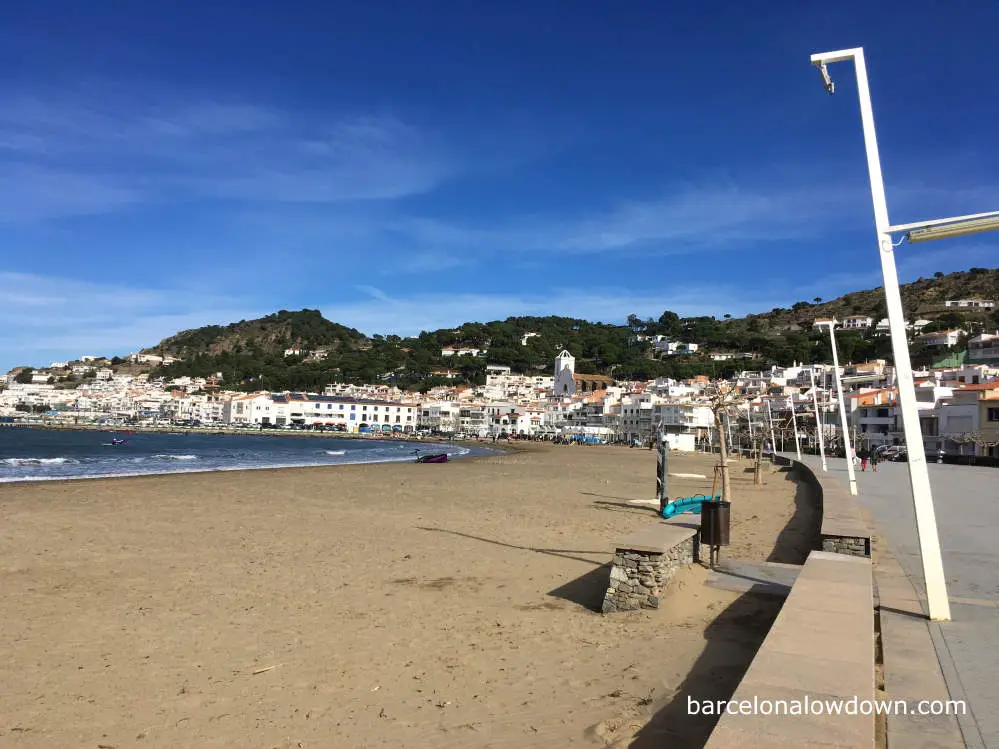 Sandy beach and boardwalk at El Port de la Selva