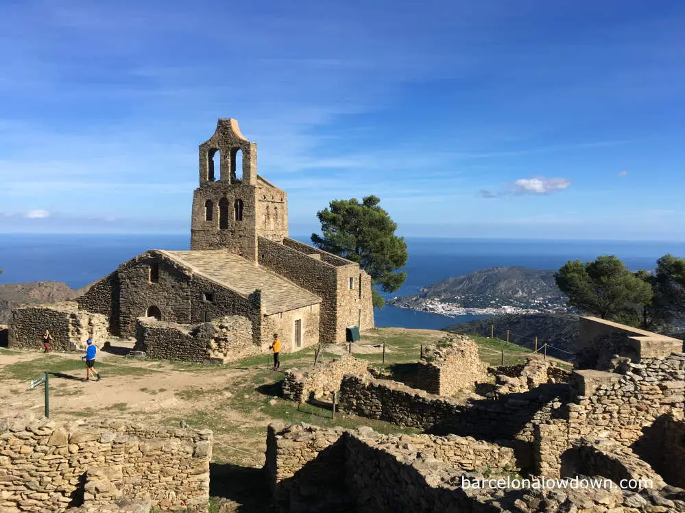 The ruined village of Santa Creu de Rodes with El Port de la Selva in the background