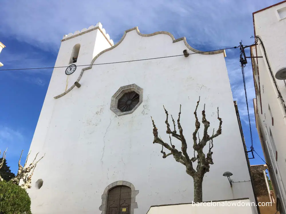 Traditional whitewashed church in Port de la Selva, Spain
