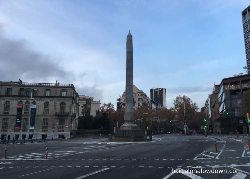 A tall granite obelisk in Barcelona