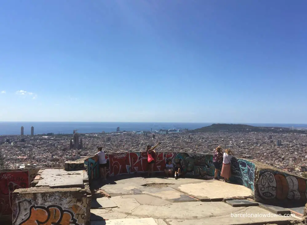 Tourists enjoying the views at the Bunkers del Carmel on the Turo de la Rovira, Barcelona