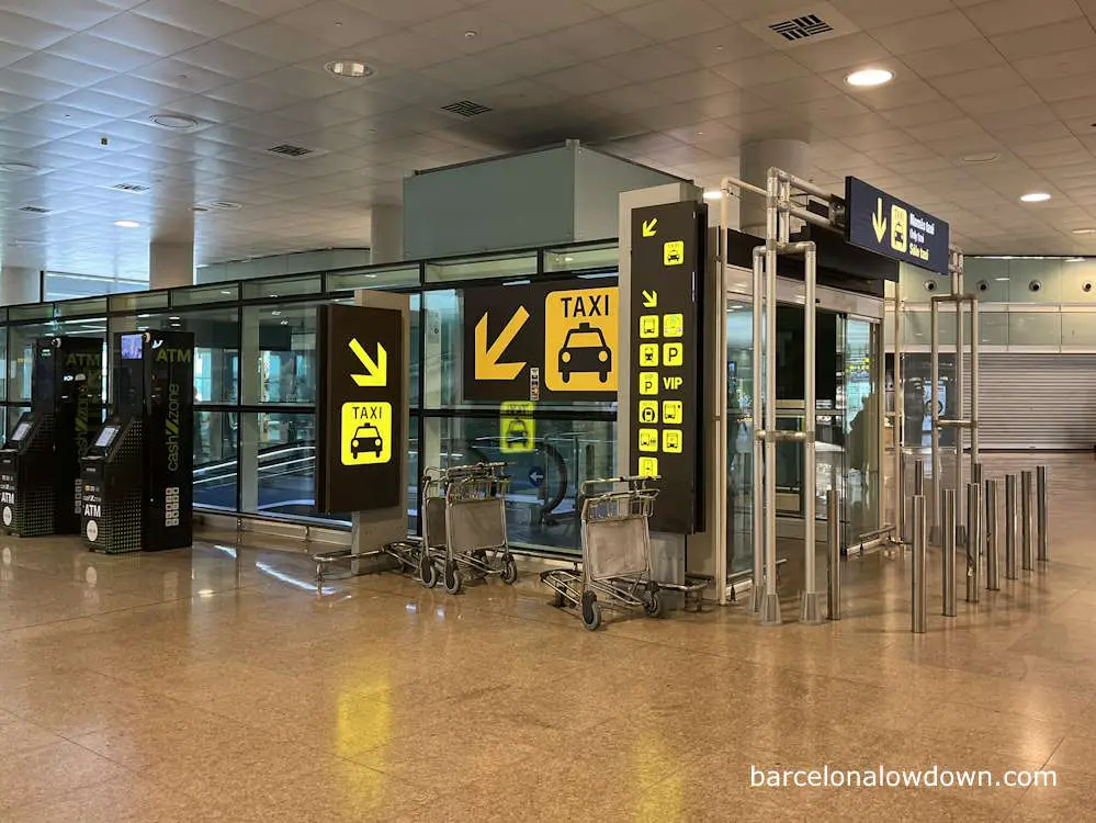 The ramp down to the taxi rank at Barcelona Airport Terminal 1