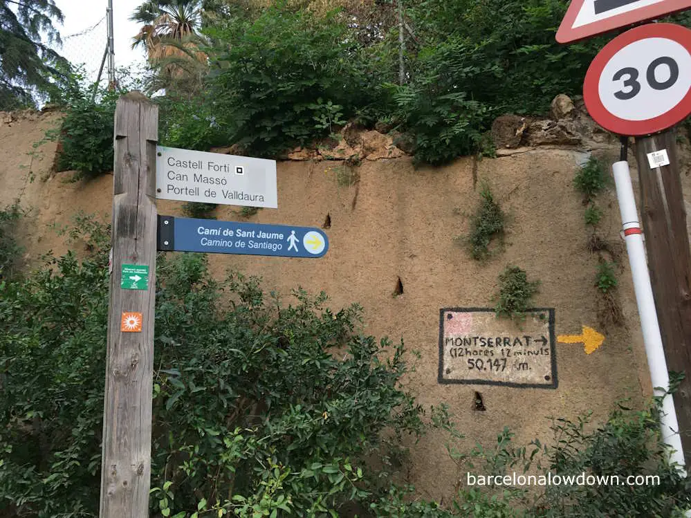 Signs indicating the way on the Camino de Santiago in Barcelona