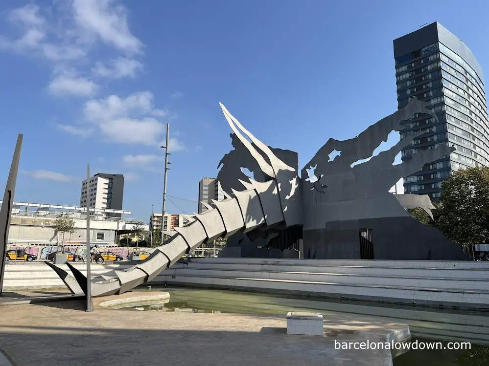 A large sculpture of a dragon in Barcelona