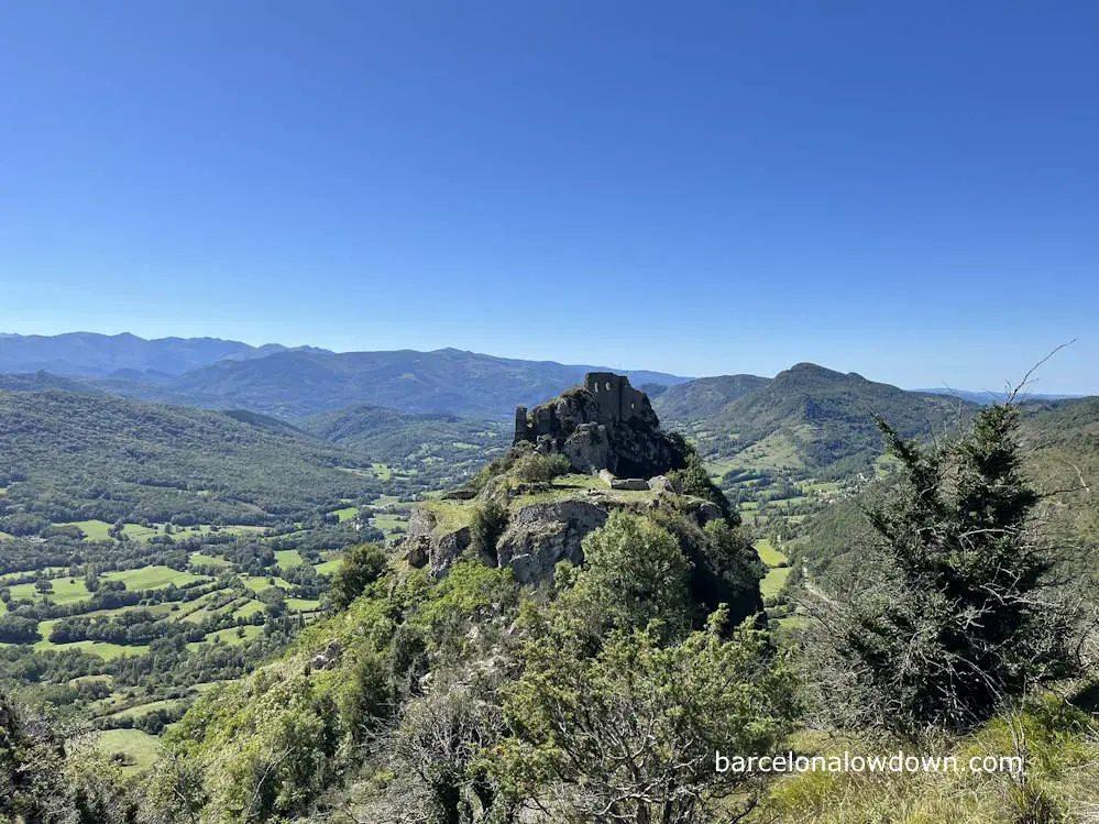 The ruins of Roquefixade castle surrounded by mountains