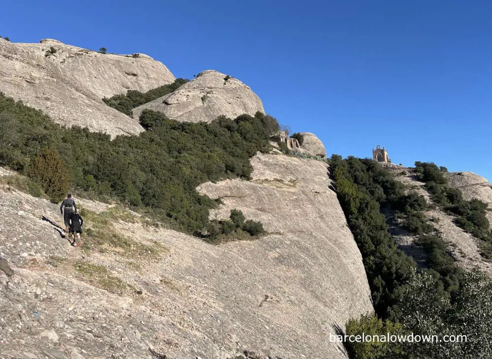 Two people hiking on Montserrat